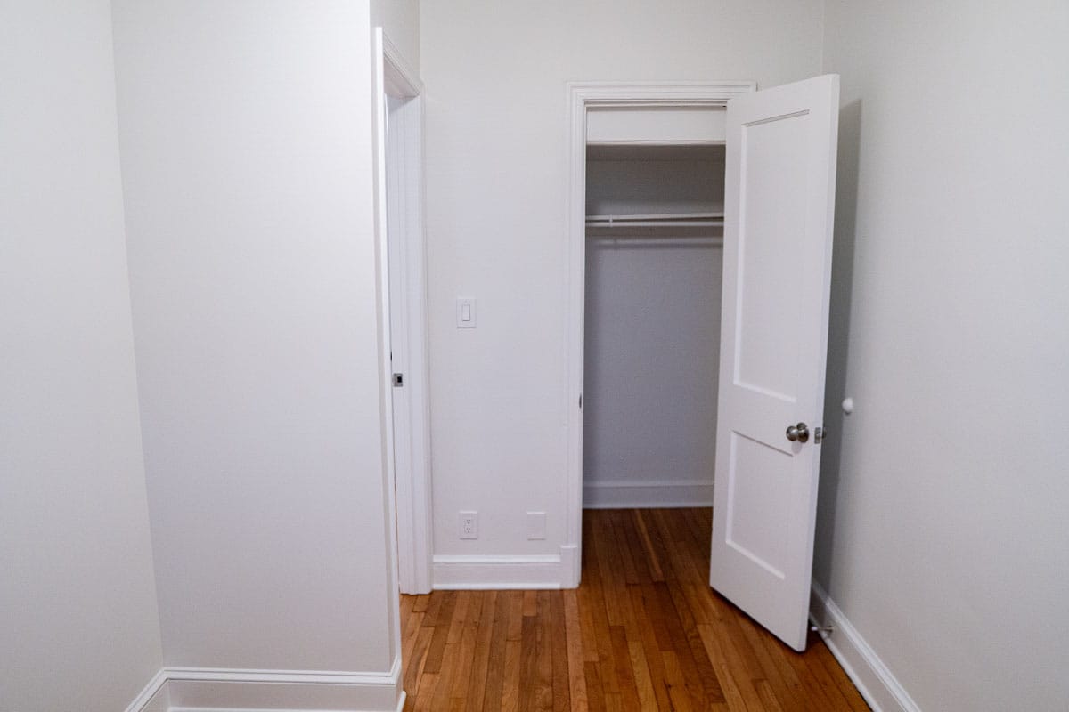 Drywall installation, finishing and painting done inside an apartment bedroom