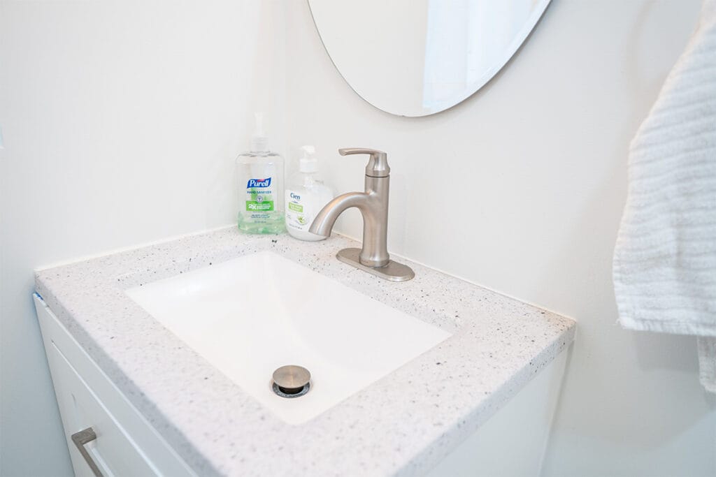 Closeup on sink installed in a DC rowhouse powder room