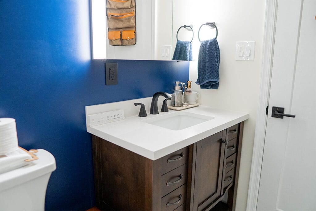 Closeup on sink installed in a Virginia hallway bathroom
