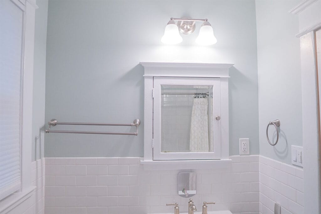 DC hallway bathroom with new light gray painting