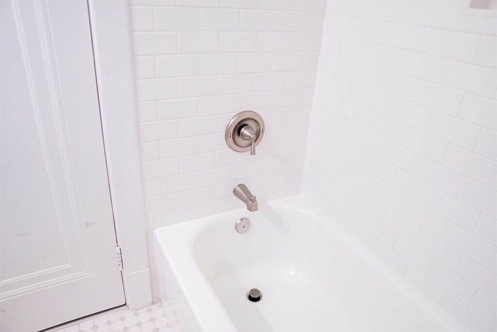 New shower faucet installed in a tub and shower located in Takoma DC