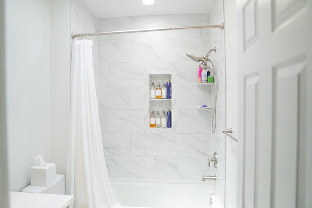 Wide view of a hallway bathroom remodeled in DC